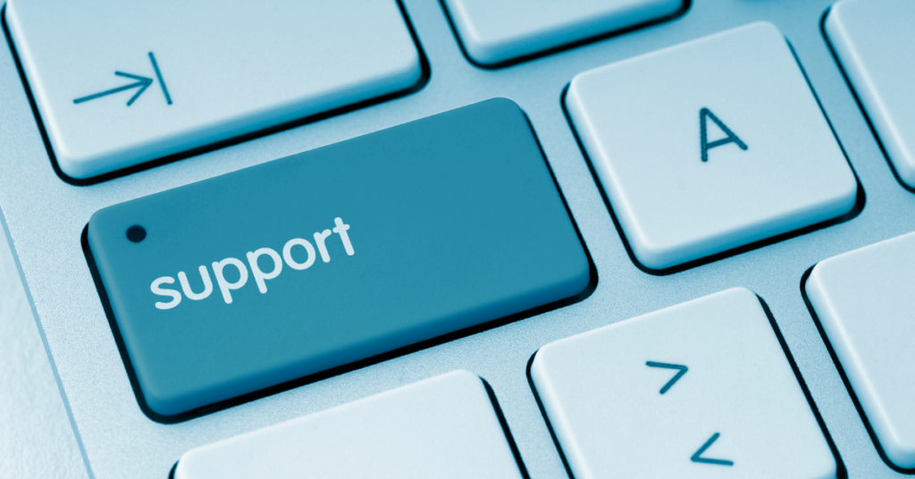 Business team in Norwich reviewing IT performance after outgrowing basic IT support